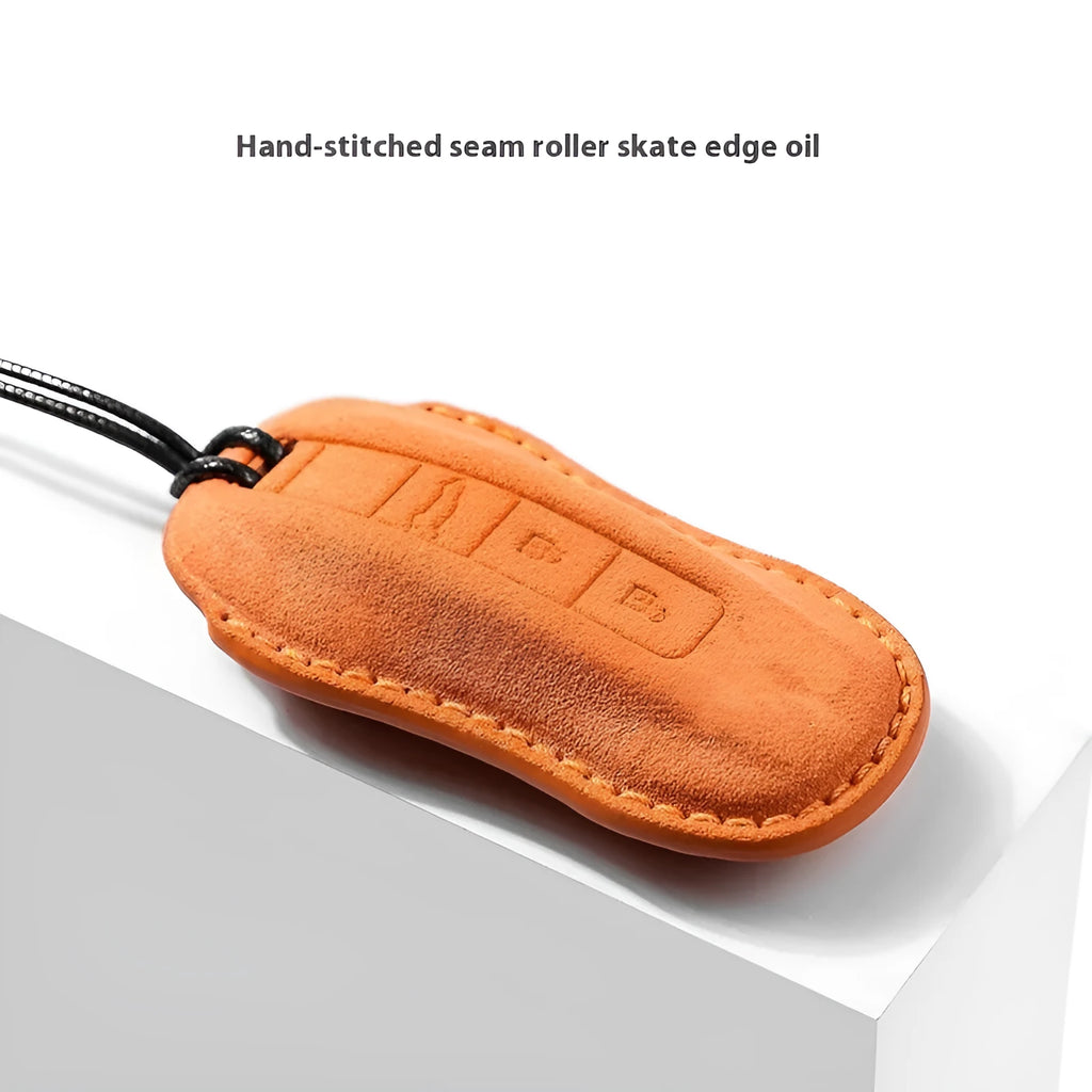 Suede car key cover for Porsche-style key fobs in four colour options.