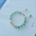 Hetian jade peach blossom strawberry quartz crystal bracelet with natural crystal design