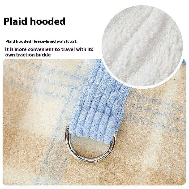 Blue corduroy dog vest with a chessboard grid pattern and an attached yellow hood.