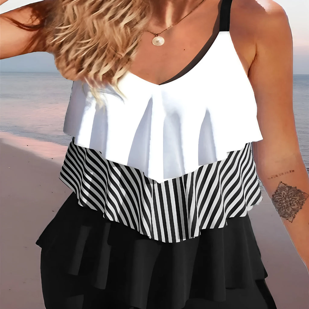Women's sleeveless backless bikini swimsuit with spaghetti straps and ruffle detailing