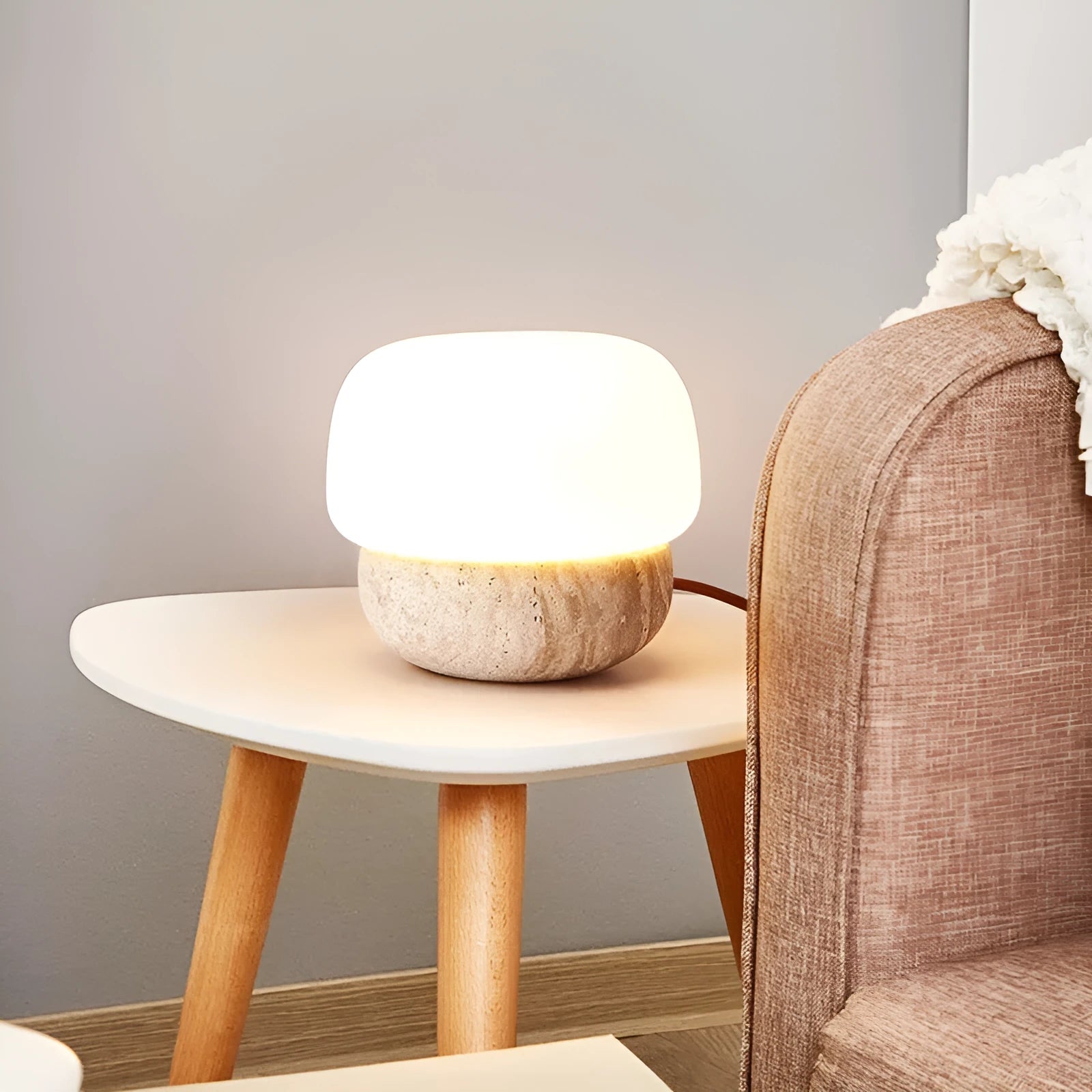 Cream coloured retro style bedside lamp with a button switch, measuring 18cm by 17cm.