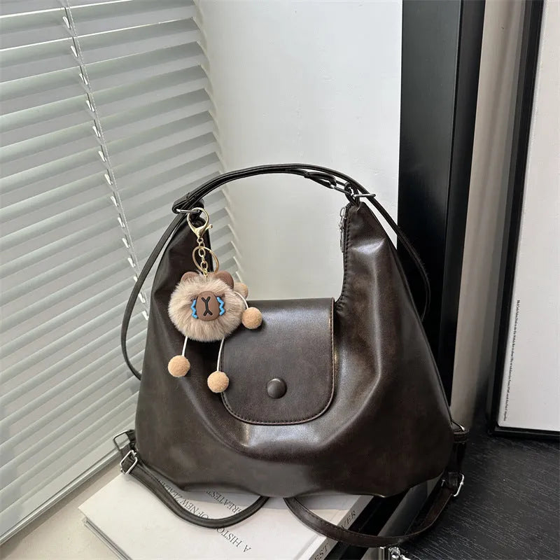 Large capacity PU leather commuter shoulder bag with mobile phone compartment in urban simplicity design