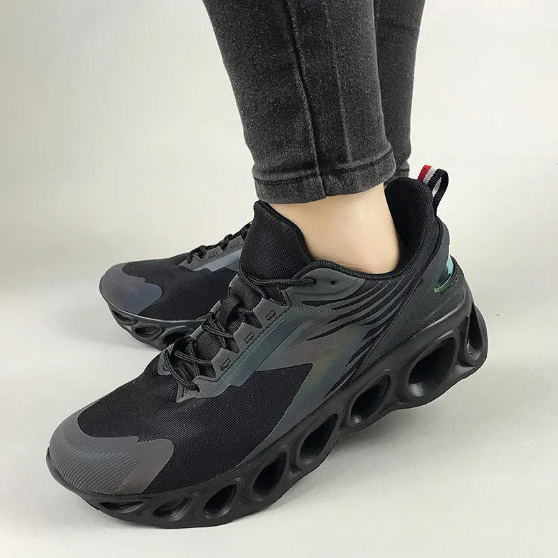 Men's low-top breathable mesh casual sports shoes in black, white, and dark blue on a white background.