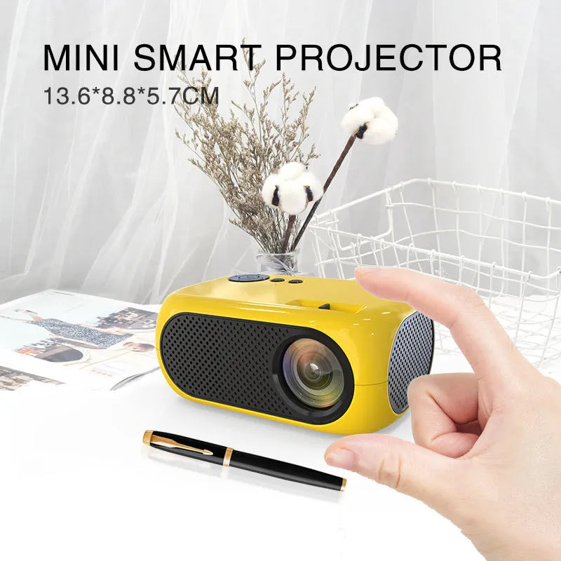 M24 micro mini projector in gold or white with power adapter and AV cable