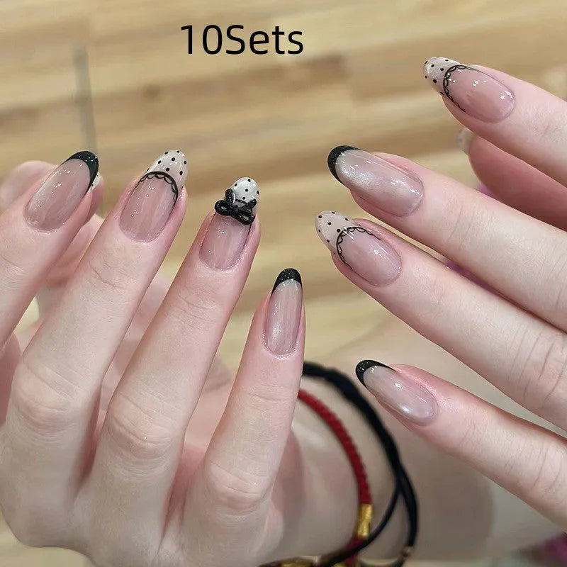 Sweet girly press-on false nails with 500 pieces of 3D heart, star, cloud, and butterfly stickers.