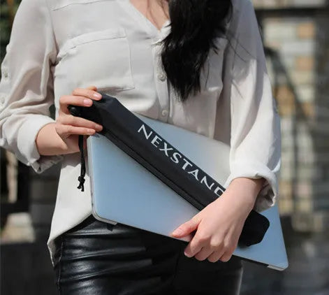 Black folding portable laptop stand showing folded dimensions of 35.4cm wide