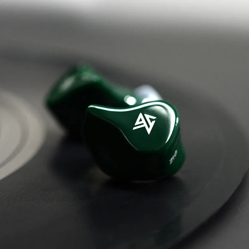 Black Z1 true wireless Bluetooth in-ear headphones with earbuds displayed next to charging case.