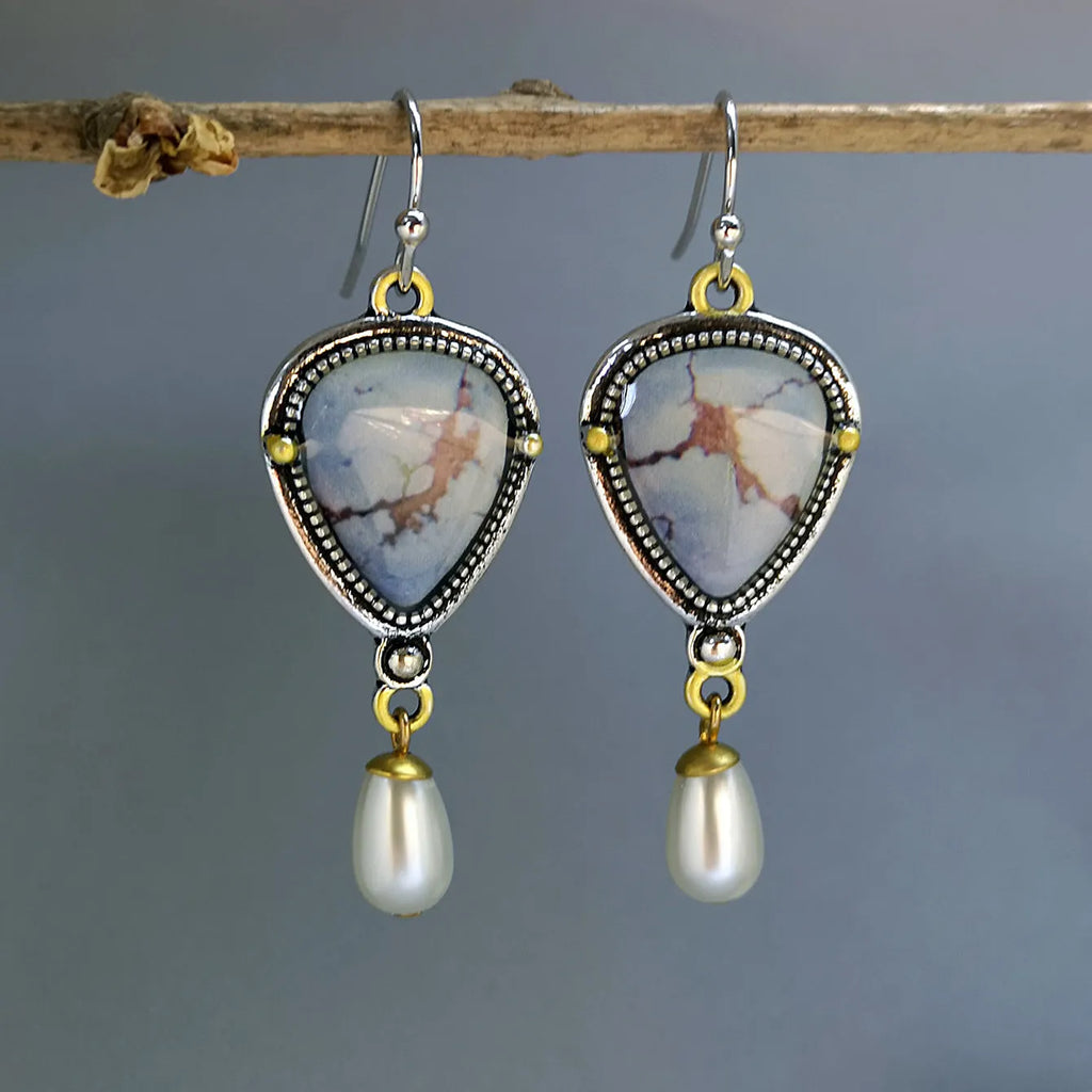 Retro blue drop earrings with geometric design featuring synthetic opal and pearl details
