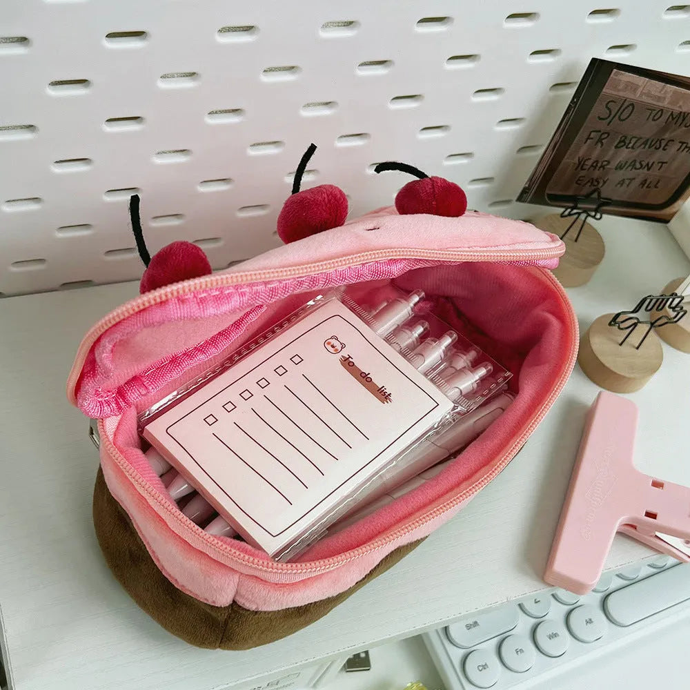 Korean style velvet pencil case with red and pink cherry cake plush design.