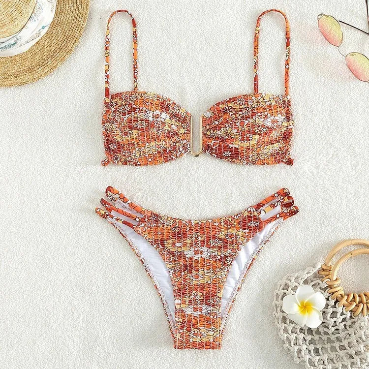 Women's high-waisted floral bikini swimsuit in blue, orange, pink, or rose red.