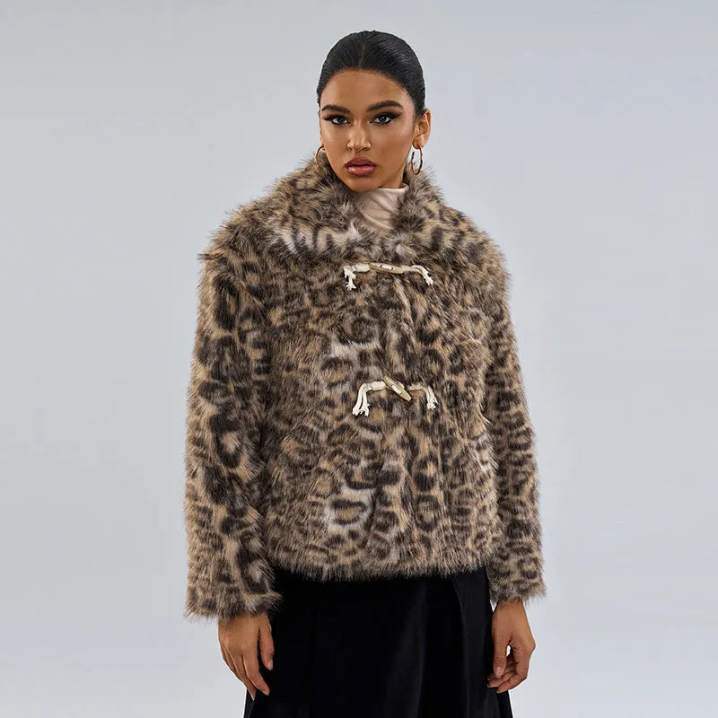 Female leopard print coat with a silver buckle detail on the lapel.
