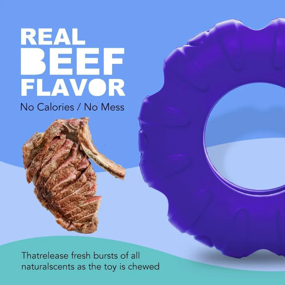 Blue natural rubber tyre-shaped dog chew toy with oval openings for treat dispensing.