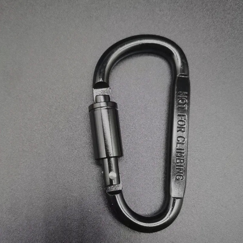 D-type aluminium locking climbing carabiner with screwgate, shown in a bright colour on a grey background.