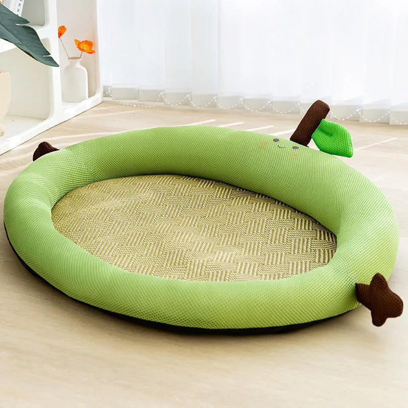 Green fruit-shaped backrest pet cooling mat nest for dogs and cats on a wooden floor.
