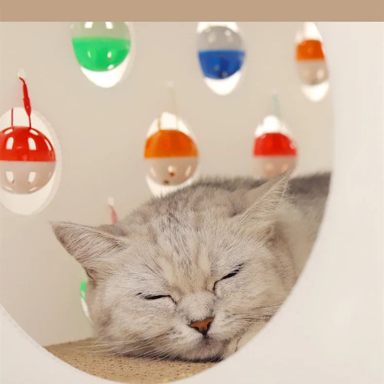 Integrated cat scratch board with nest featuring bell ball toy and plastic tunnel construction
