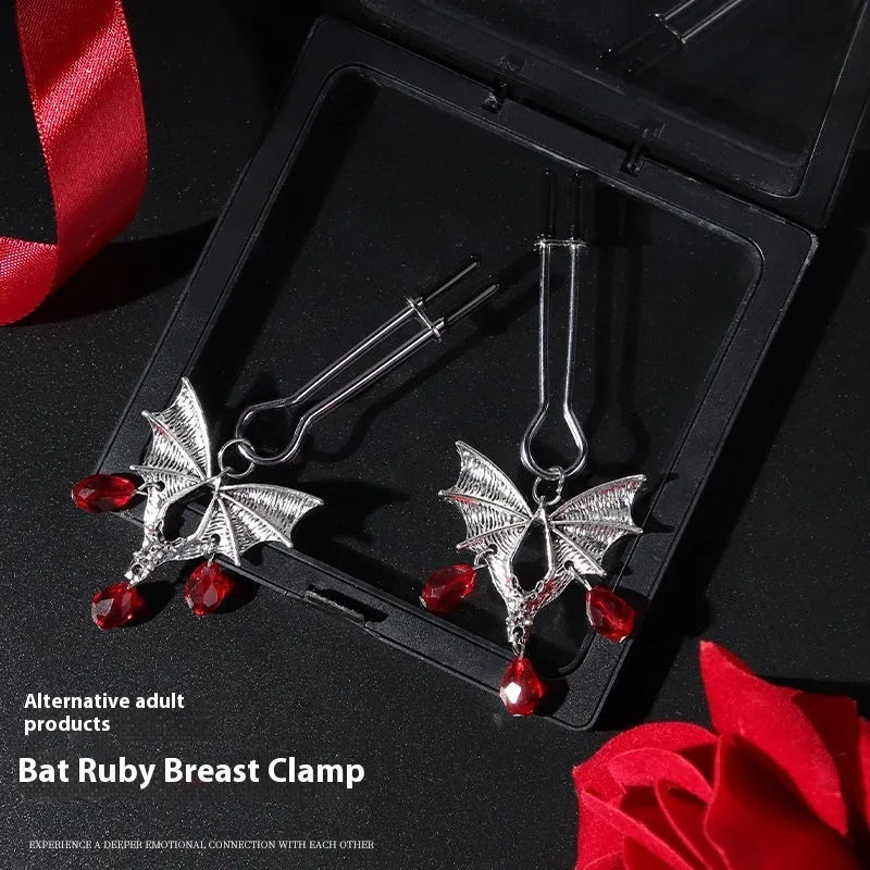 Silver alloy diamond bat nipple clamp with adjustable tension and ruby bat clip design