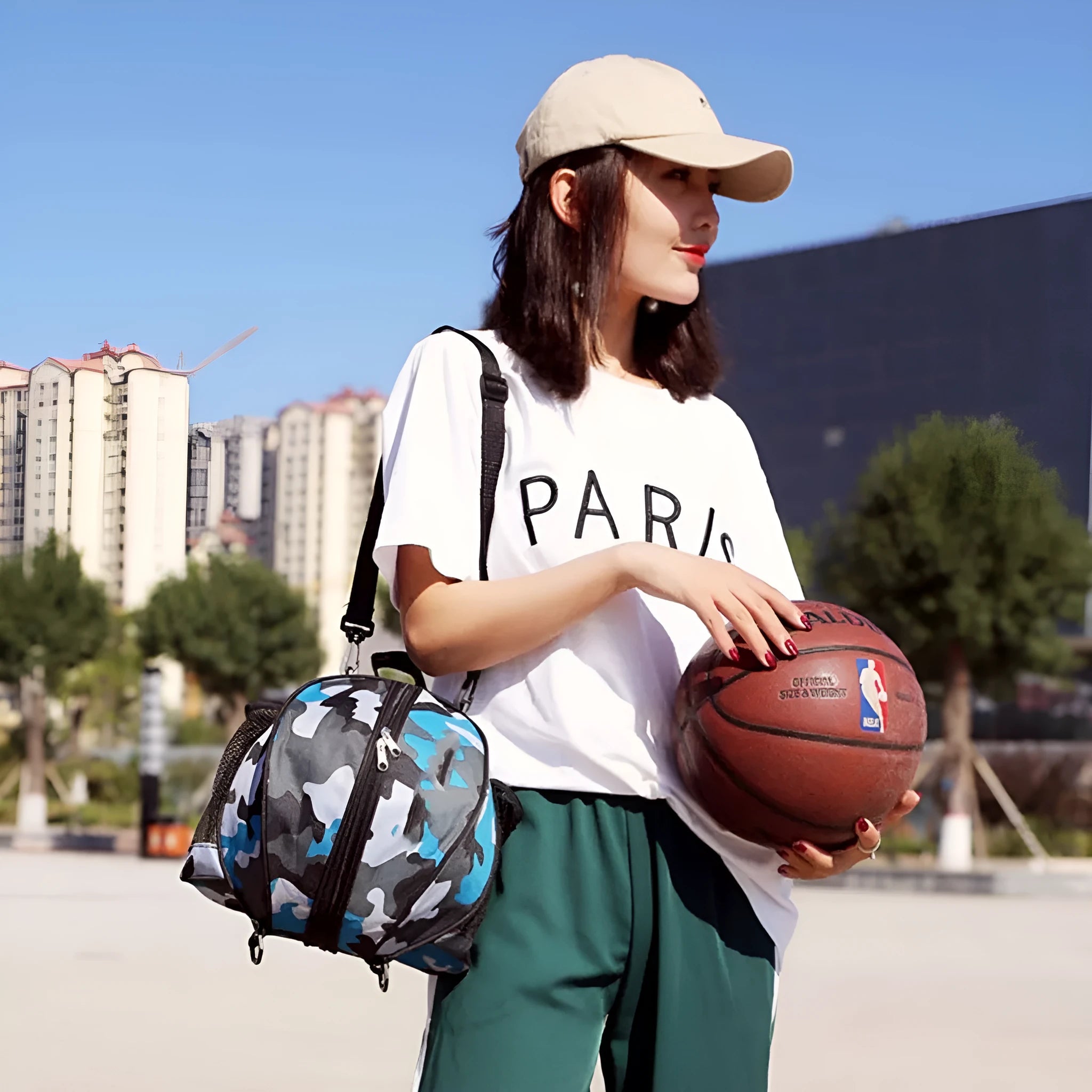 Oxford cloth basketball training bag with dual strap options shown in a colour selection including black, blue, and camouflage.