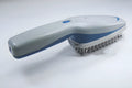 Pet comb with air purification function showing removable brush head and 78 comb teeth.
