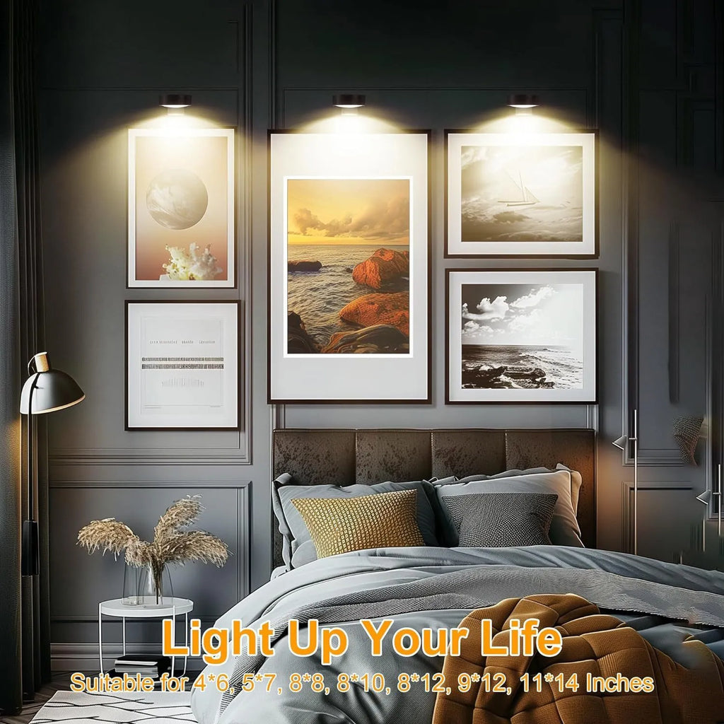 Magnetic wireless LED picture light with remote control in black finish illuminating a painting