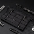 Black military-style Oxford cloth waist bag shown closed, measuring 18cm.