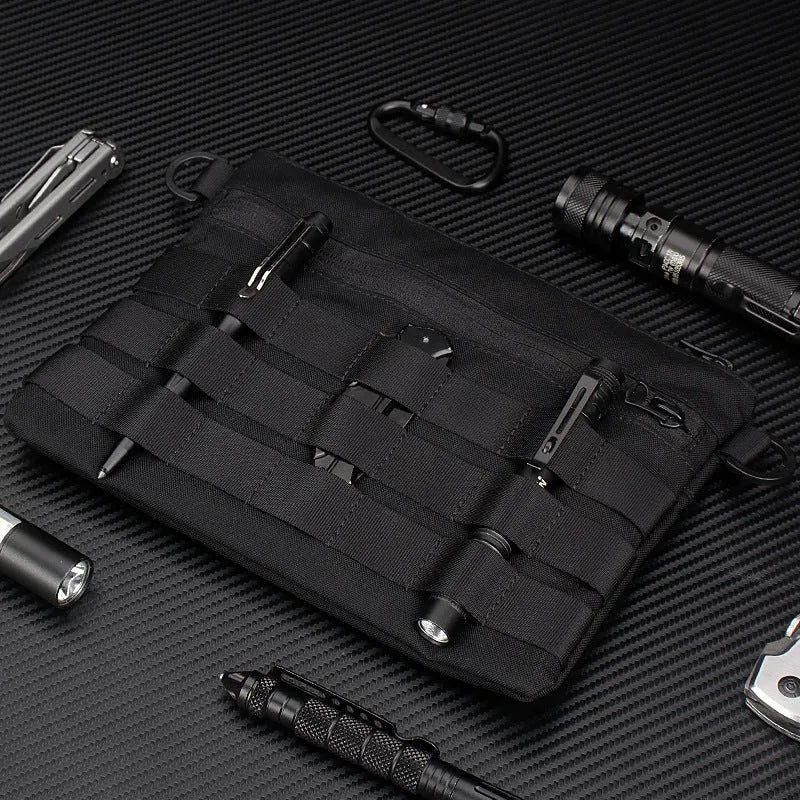 Black military-style Oxford cloth waist bag shown closed, measuring 18cm.