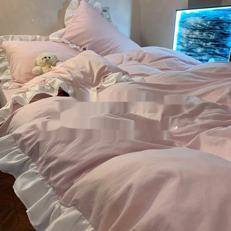 Washed cotton four-piece bedding set in Mori style showing lace-trimmed solid colour options