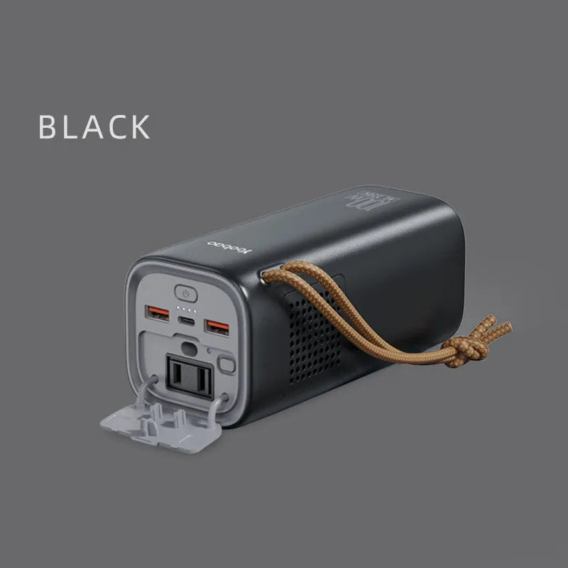 Black portable power bank with solar panel and display, showing 200W output and charging ports.