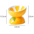 Ceramic elevated cat bowl in orange colour with tilted wide dish design.