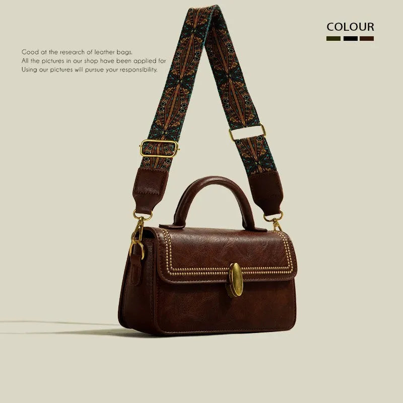 Brown retro messenger bag with square vertical shape showing sandwich pocket design and shoulder strap