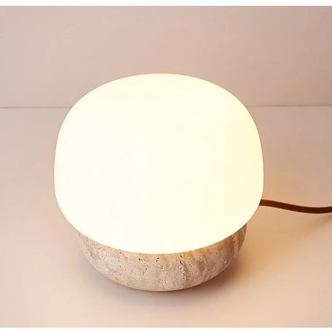 Cream coloured retro style bedside lamp with a button switch, measuring 18cm by 17cm.