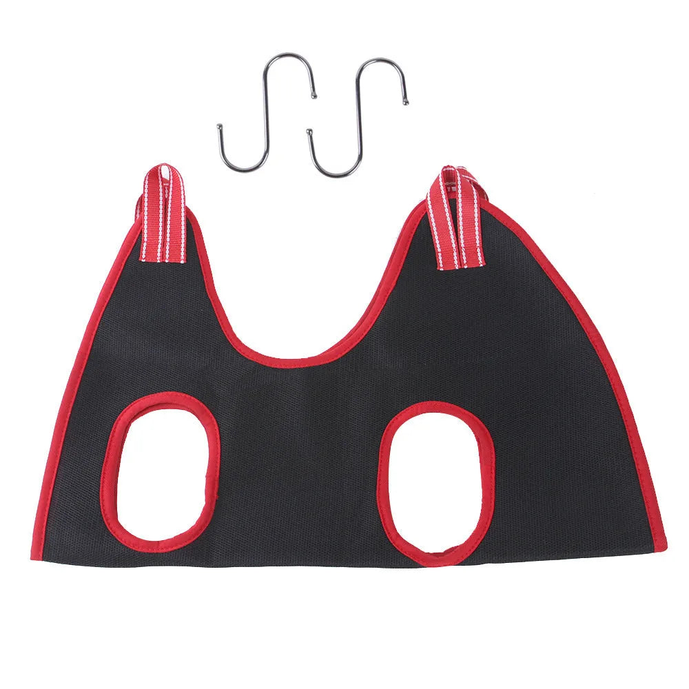 Hanging pet grooming restraint hammock bag in use for dog nail trimming.
