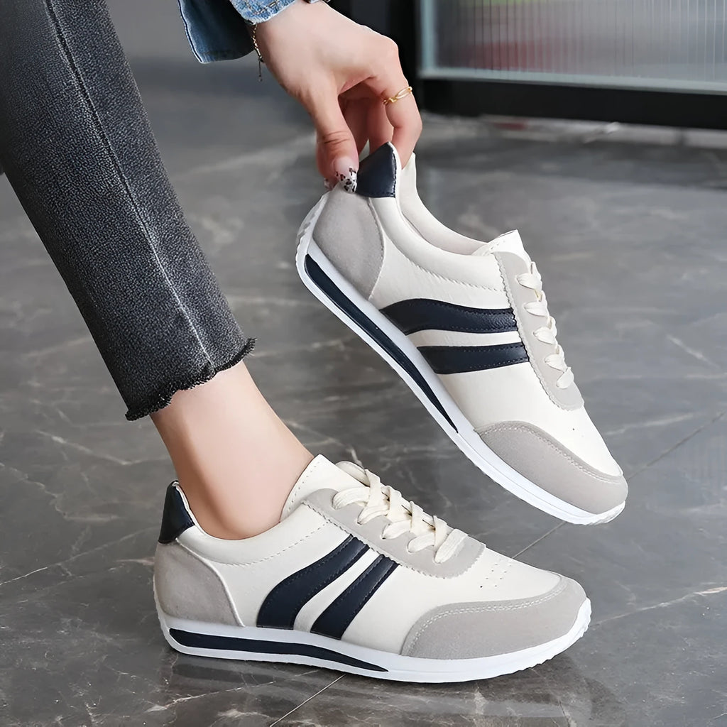 Red and blue low-top lace-up leisure sneakers with PU mesh upper and rubber sole.