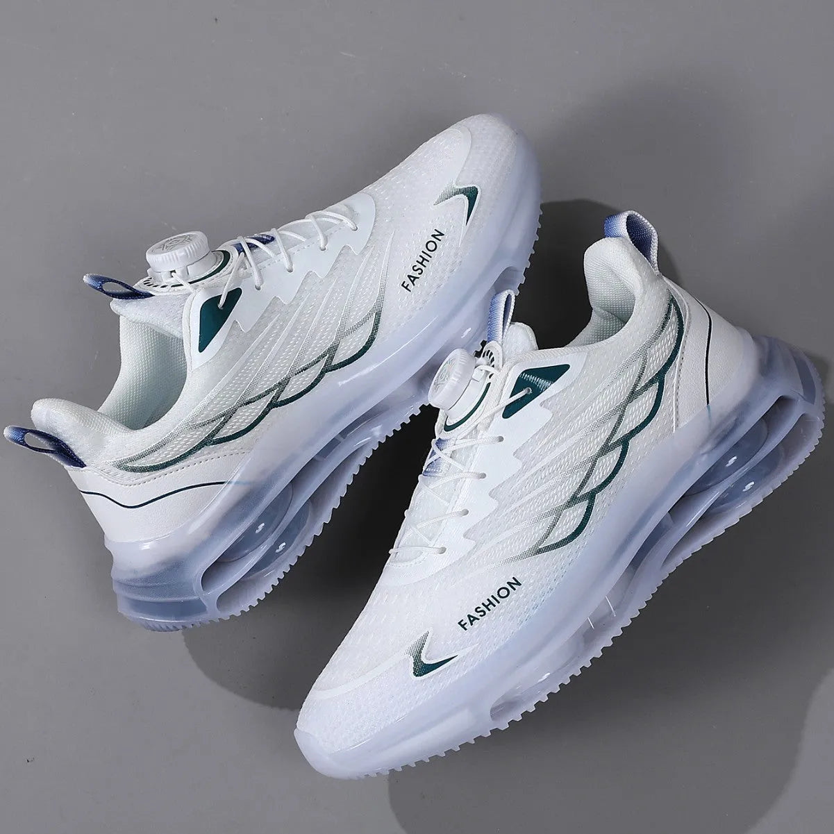White low-top casual running shoes with mesh upper and rubber sole on solid background
