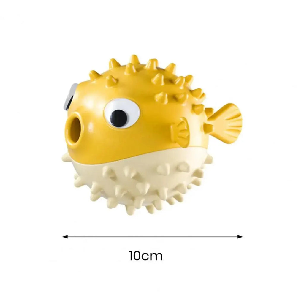 Yellow fish-shaped vinyl dog chew toy with textured surface and squeaker