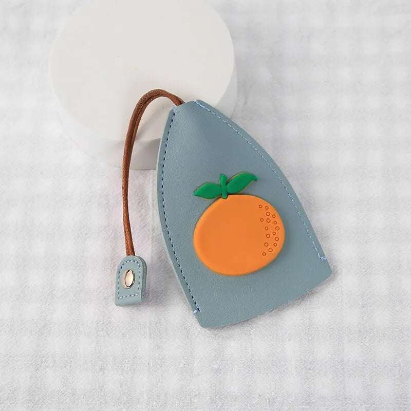 Colourful cartoon pull-out key case made from PU leather showing design options