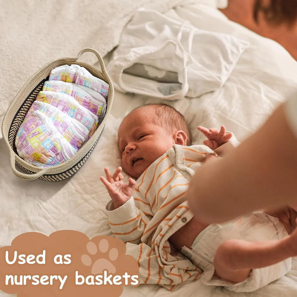 Small light beige handmade woven cotton rope storage basket with wooden handle
