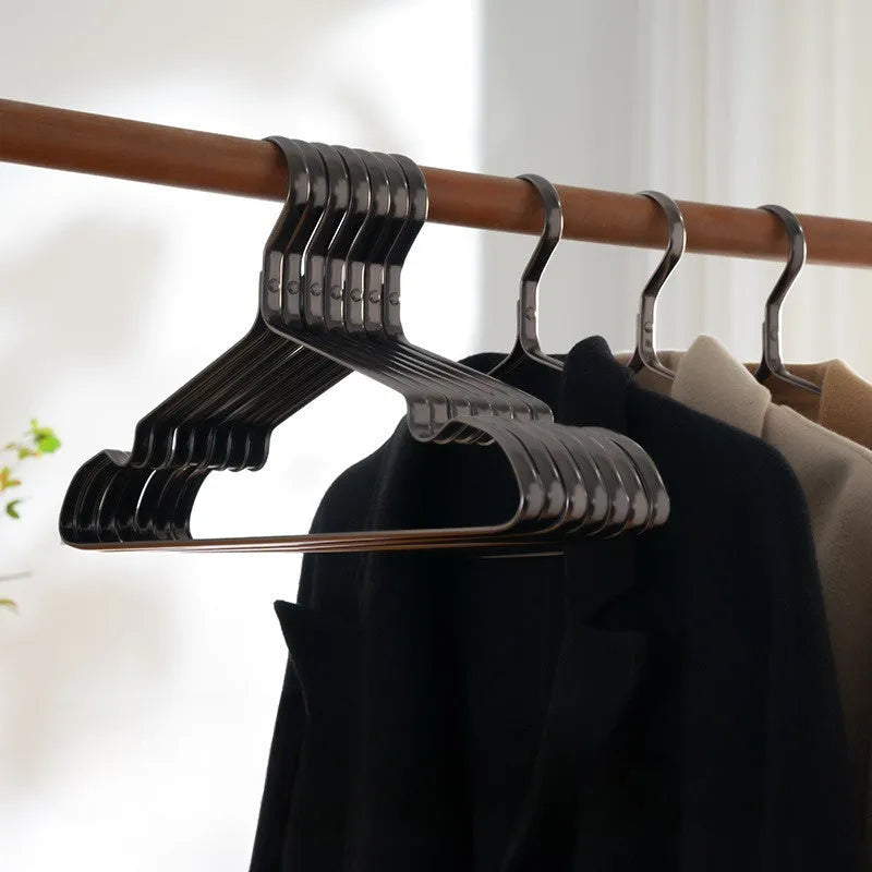 Elegant black modern simplicity clothes hanger with anti-slip surface.