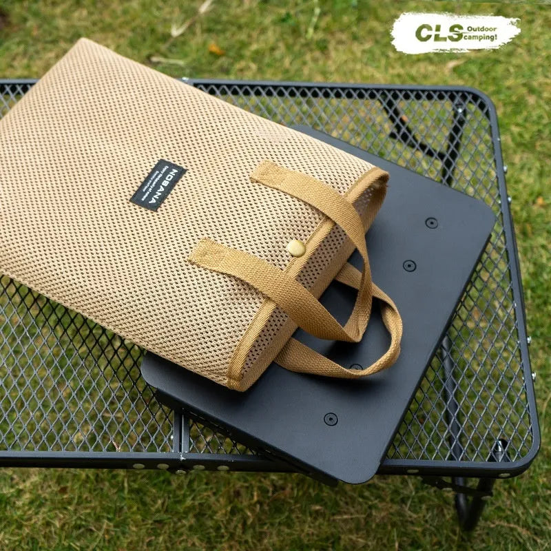 CLS aluminium folding camping stool with PU mat cushion, shown converted into a small side table.