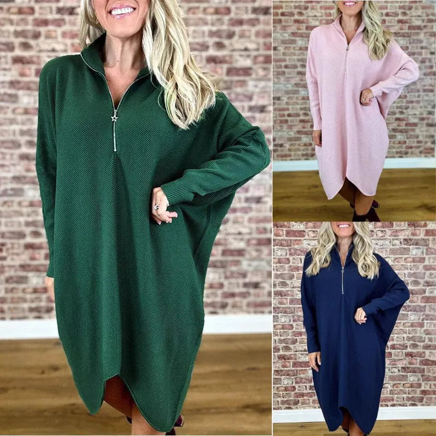 Women's solid colour loose knitted dress with raglan sleeves on a hanger