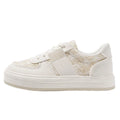 Beige plaid platform sports shoes with lace-up front and rubber soles