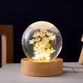 Luminous 3D dandelion in crystal ball on beech wood stand, USB-powered desktop night light.