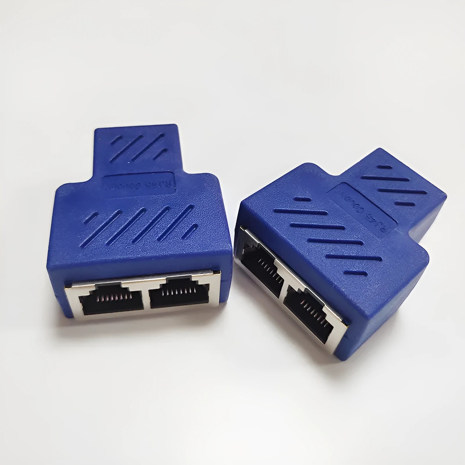 White RJ45 network cable splitter adapter dividing one Ethernet connection into two ports