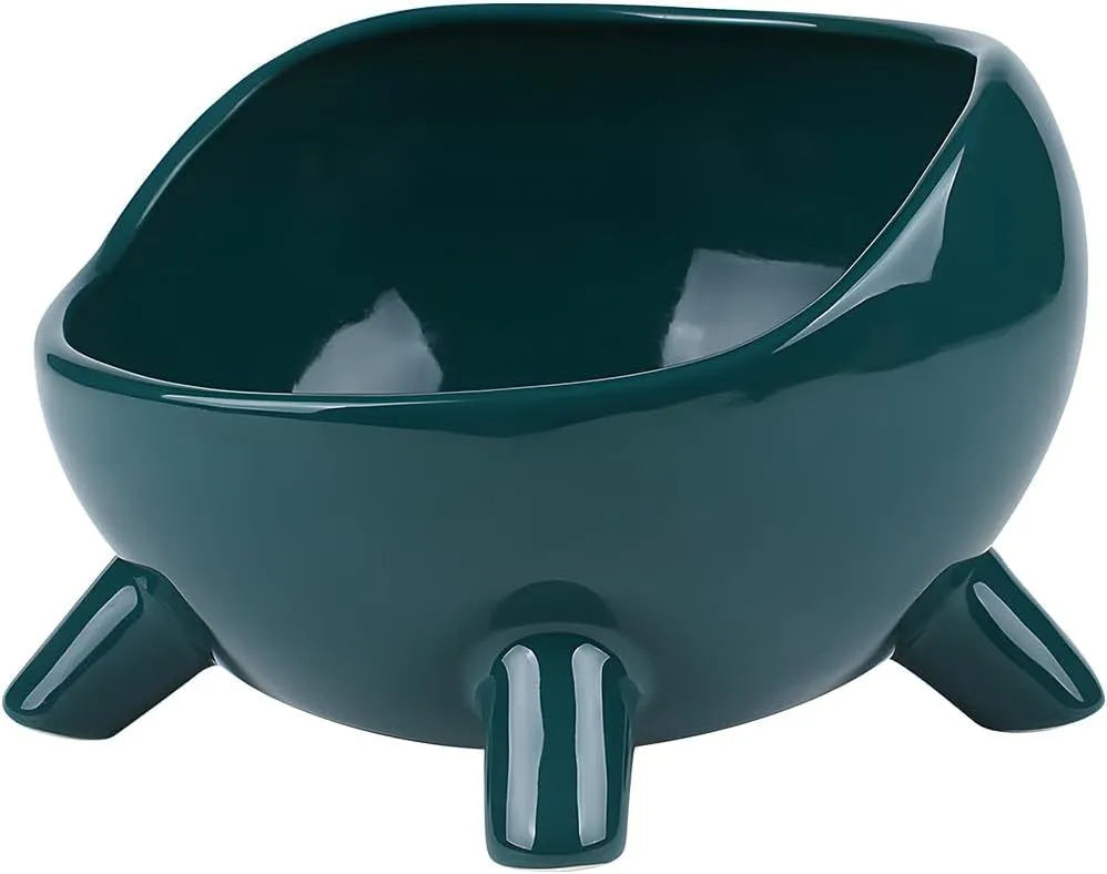 Green ceramic pet food bowl with four legs and a wide, rounded opening.
