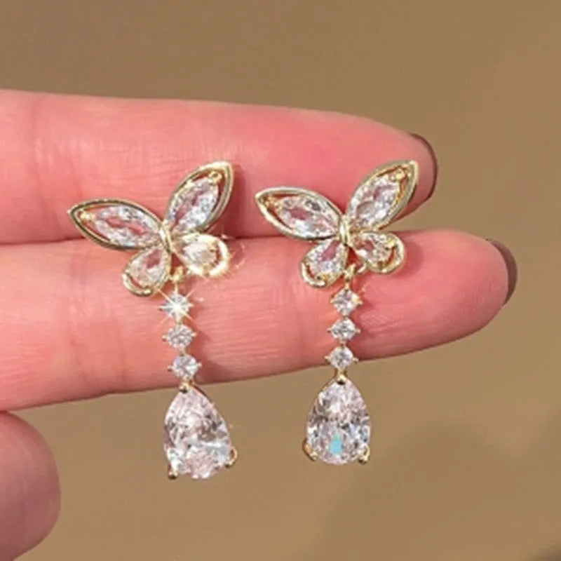 Platinum colour bow stud earrings with zinc alloy construction and electroplated finish