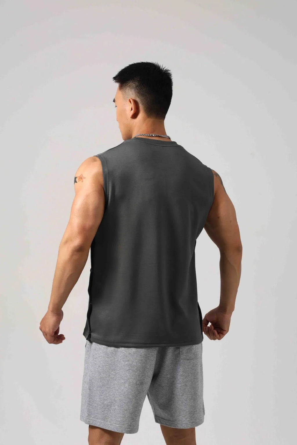 Men's Korean style loose cotton fitness vest with hidden hook fastening on sides