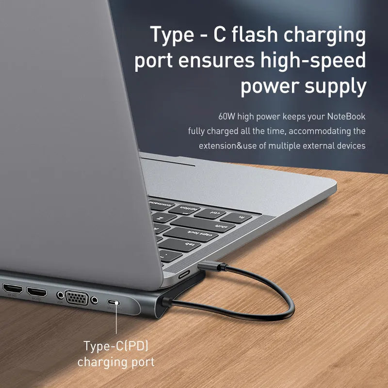 Grey aluminium alloy USB-C docking station with 10 ports and cooling bracket on desktop
