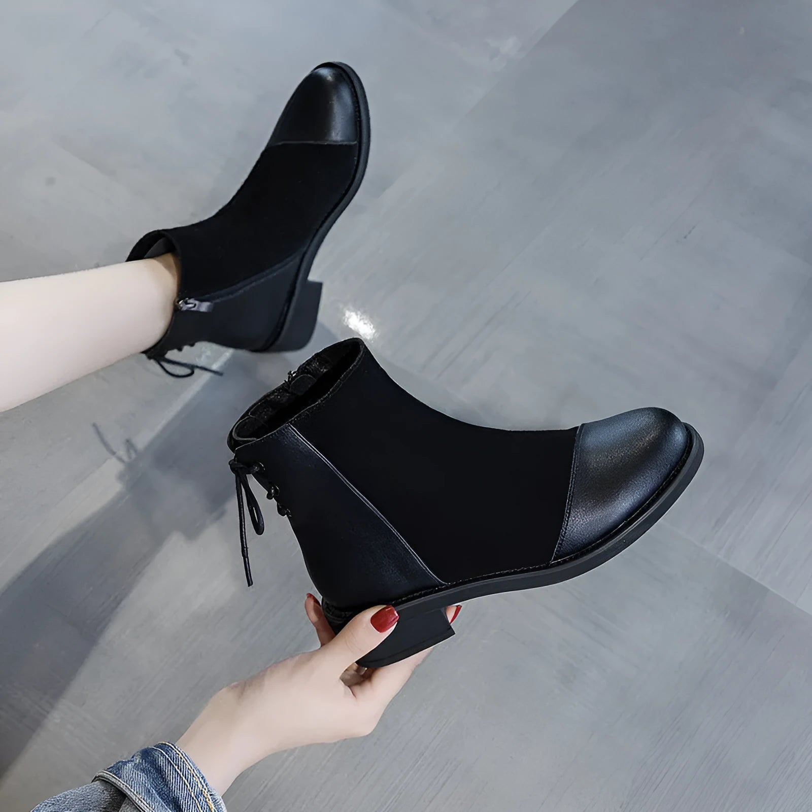 Women's black soft leather Martin boots with side zip and round toe design