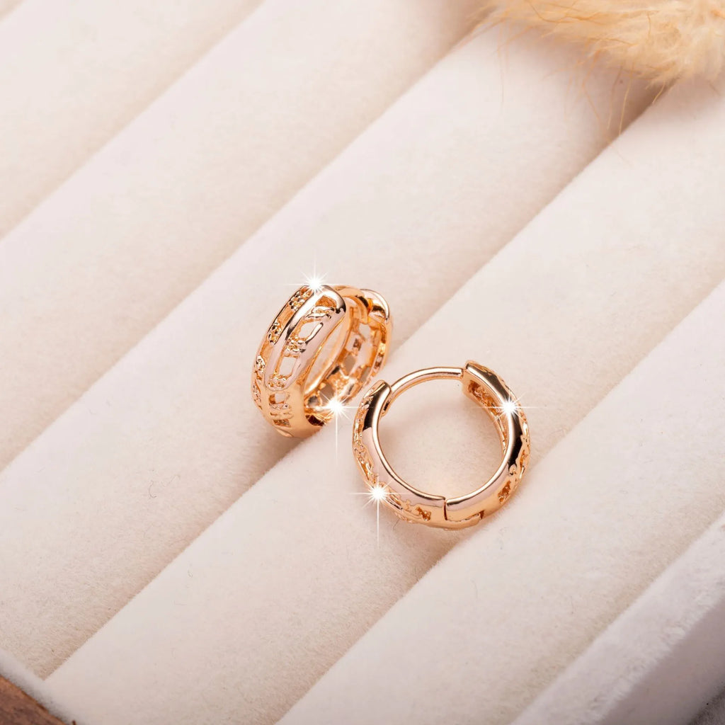 Rose gold plated copper earrings with hollowed leaf and heart designs