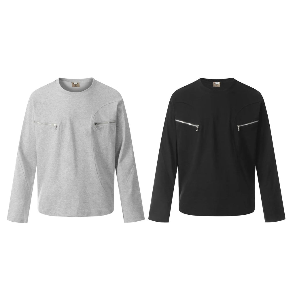 Man wearing a grey loose fit cotton long sleeve pullover with a simple retro design.