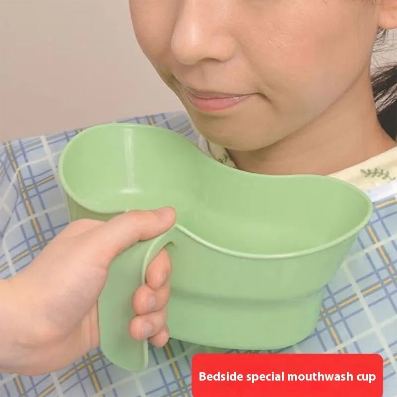 Green plastic mouthwash cup for bedridden patient nursing care